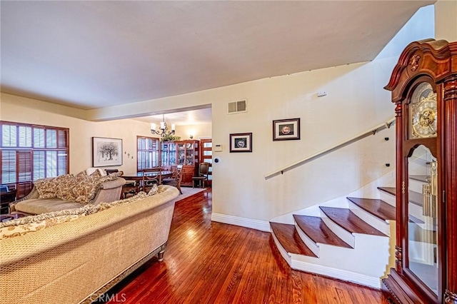 1151 Arapahoe St, Los Angeles, CA 90006 - living area with a chandelier, stairs, baseboards, and wood finished floors