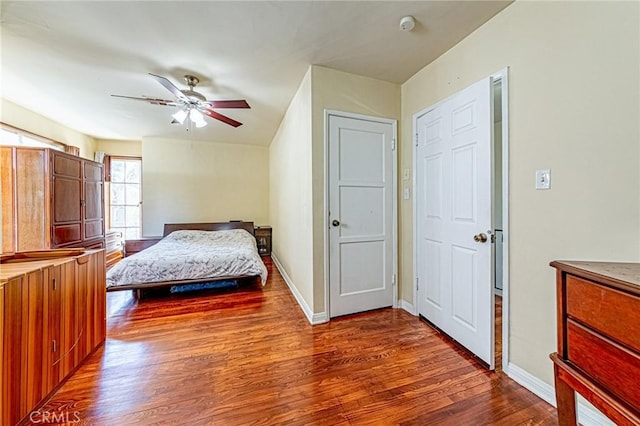 1151 Arapahoe St, Los Angeles, CA 90006 - bedroom with dark wood-style flooring, baseboards, and a ceiling fan