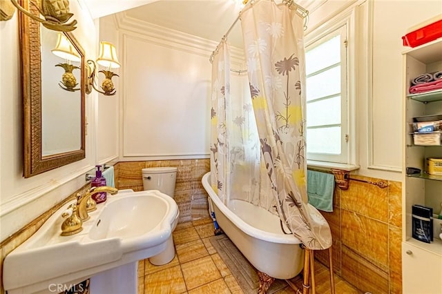 1151 Arapahoe St, Los Angeles, CA 90006 - full bathroom with plenty of natural light, a bathtub, a shower with curtain, tile patterned flooring, and tile walls