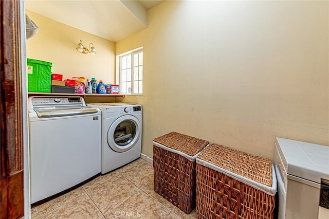 1151 Arapahoe St, Los Angeles, CA 90006 - laundry area featuring washer and clothes dryer and light tile patterned flooring