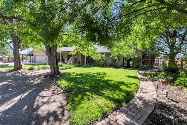 17276 Iona Ave, Lemoore, CA 93245 - view of front of house with a front lawn and stucco siding