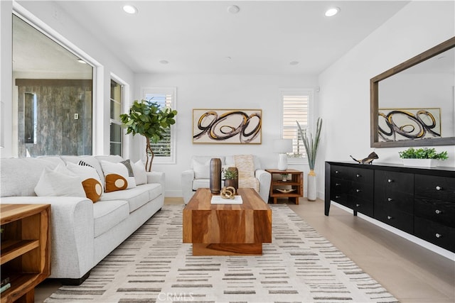 1844 Aliso Canyon Dr, Lake Forest, CA 92610 - living room featuring healthy amount of natural light, recessed lighting, and baseboards