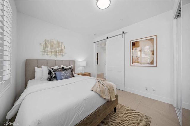 1844 Aliso Canyon Dr, Lake Forest, CA 92610 - bedroom featuring a barn door and light tile patterned floors
