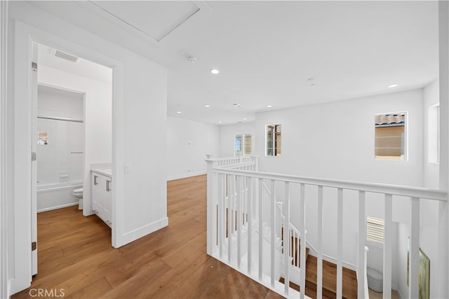 1844 Aliso Canyon Dr, Lake Forest, CA 92610 - hall featuring light wood finished floors, recessed lighting, an upstairs landing, and baseboards