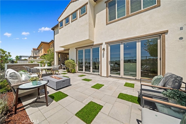 1844 Aliso Canyon Dr, Lake Forest, CA 92610 - view of patio with an outdoor fire pit