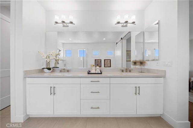 1844 Aliso Canyon Dr, Lake Forest, CA 92610 - bathroom featuring double vanity, baseboards, and a shower