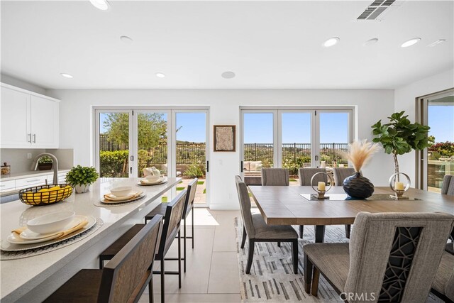 1844 Aliso Canyon Dr, Lake Forest, CA 92610 - dining area with recessed lighting and light tile patterned flooring