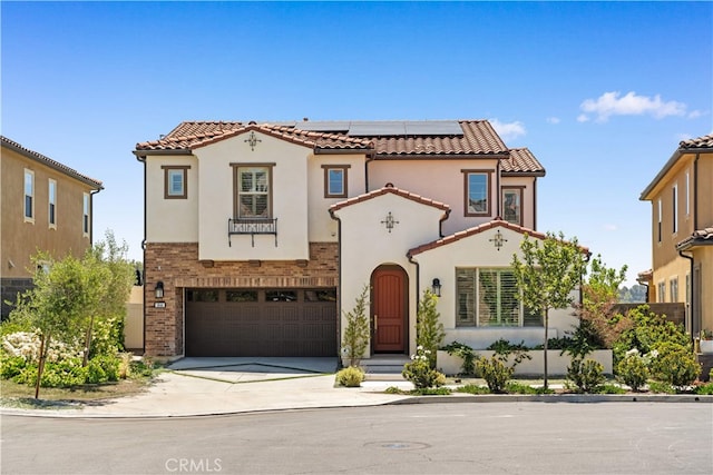 1844 Aliso Canyon Dr, Lake Forest, CA 92610 - mediterranean / spanish-style house featuring a tiled roof, driveway, solar panels, and a garage