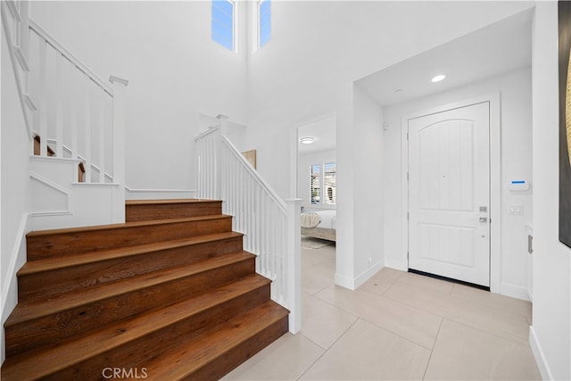 1844 Aliso Canyon Dr, Lake Forest, CA 92610 - foyer with stairway, light tile patterned floors, baseboards, and recessed lighting