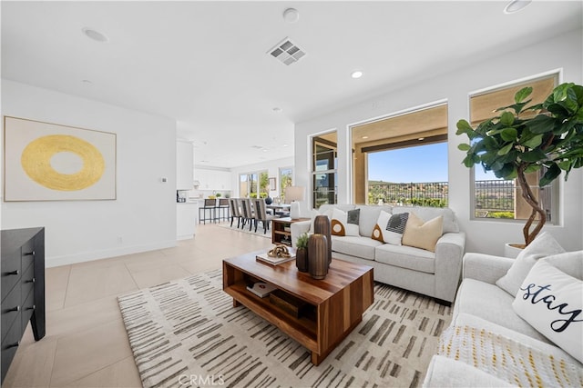 1844 Aliso Canyon Dr, Lake Forest, CA 92610 - living room featuring light tile patterned floors, recessed lighting, and baseboards
