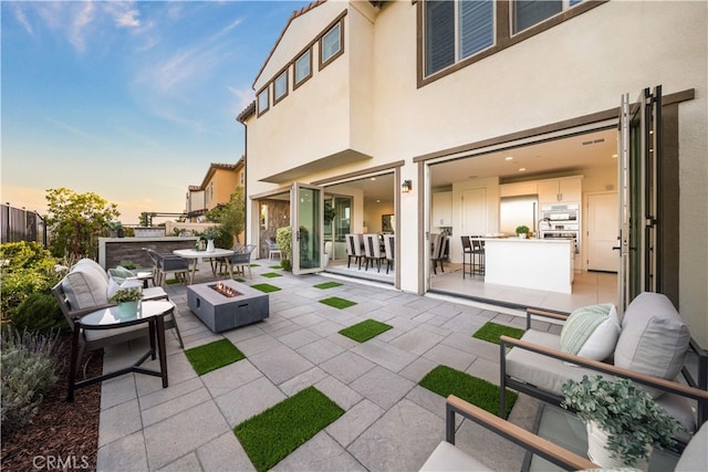 1844 Aliso Canyon Dr, Lake Forest, CA 92610 - view of patio / terrace with an outdoor living space with a fire pit