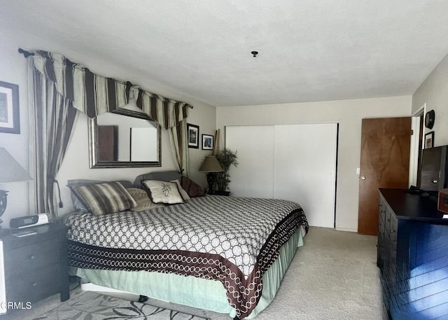 2711 S El Camino Real Unit 7, San Clemente, CA 92672 - bedroom with a closet and light carpet