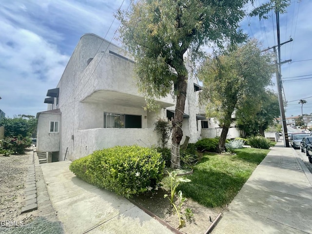 2711 S El Camino Real Unit 7, San Clemente, CA 92672 - view of home's exterior featuring stucco siding