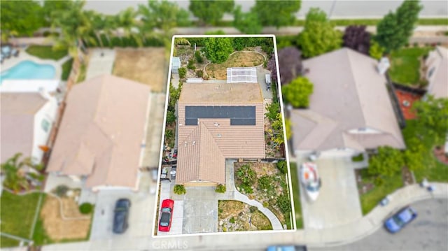1457 Quiet Ct, Merced, CA 95340 - aerial overview of property's location with property parcel outlined and a pool area
