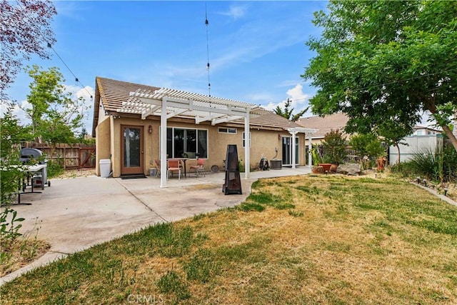 1457 Quiet Ct, Merced, CA 95340 - rear view of property with a pergola, stucco siding, and a patio area