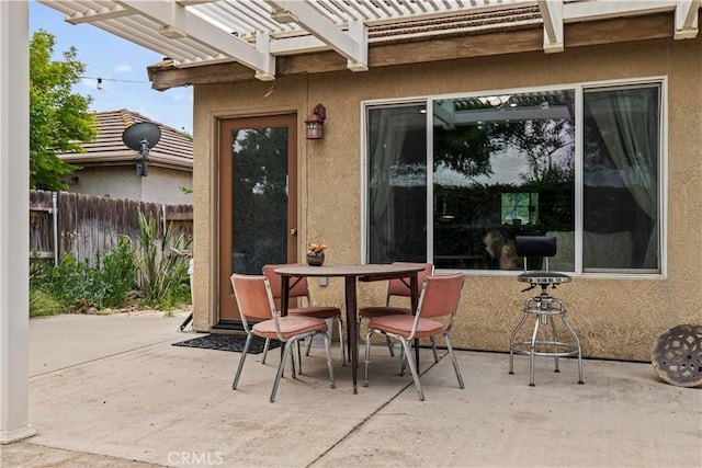1457 Quiet Ct, Merced, CA 95340 - view of patio / terrace with a pergola and outdoor dining space