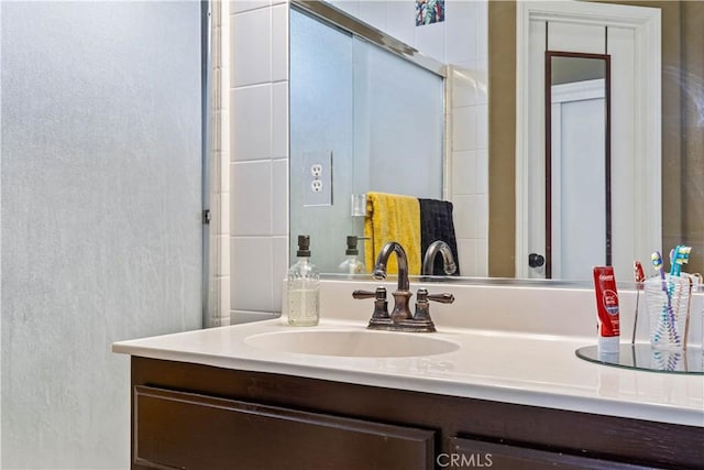 1457 Quiet Ct, Merced, CA 95340 - bathroom featuring vanity and a shower with shower door