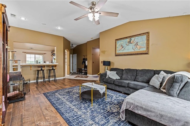 1457 Quiet Ct, Merced, CA 95340 - living area with ceiling fan, wood finished floors, baseboards, recessed lighting, and lofted ceiling