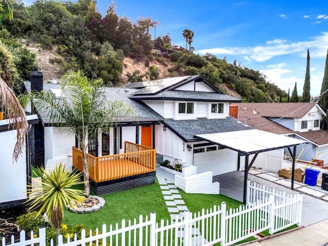 4848 54th St, San Diego, CA 92115 - view of front of property featuring roof with shingles, a chimney, concrete driveway, a garage, and a wooden deck