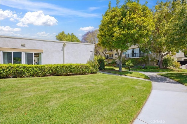 2383 Via Mariposa W Unit C, Laguna Woods, CA 92637 - view of grassy yard