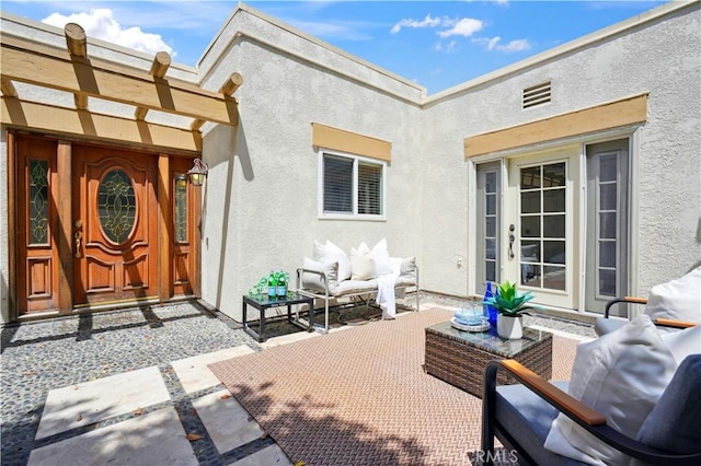 2383 Via Mariposa W Unit C, Laguna Woods, CA 92637 - view of patio / terrace featuring an outdoor living space