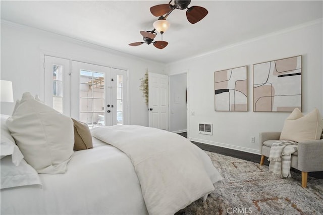 2383 Via Mariposa W Unit C, Laguna Woods, CA 92637 - bedroom featuring ornamental molding, access to outside, baseboards, wood finished floors, and a ceiling fan
