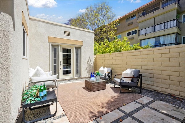 2383 Via Mariposa W Unit C, Laguna Woods, CA 92637 - view of patio with an outdoor hangout area