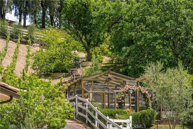 5558 Hoback Glen Rd, Hidden Hills, CA 91302 - view of home's community featuring a greenhouse and an outdoor structure