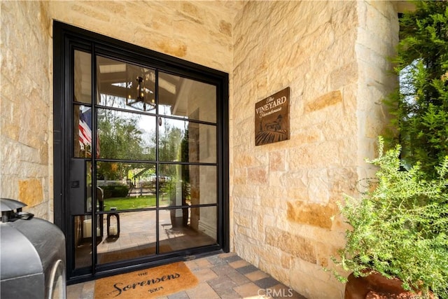5558 Hoback Glen Rd, Hidden Hills, CA 91302 - view of exterior entry featuring stone siding