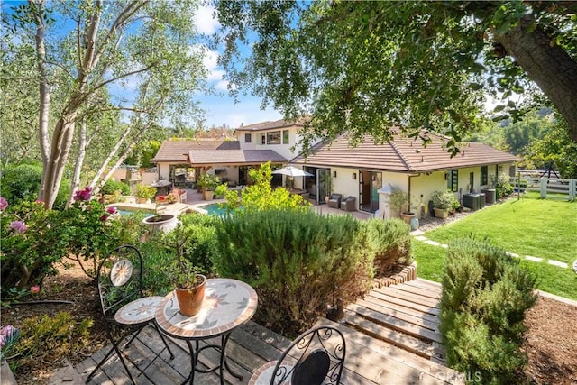 5558 Hoback Glen Rd, Hidden Hills, CA 91302 - rear view of property with stucco siding, a patio, and cooling unit