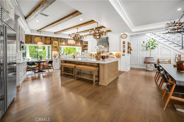 5558 Hoback Glen Rd, Hidden Hills, CA 91302 - kitchen with a chandelier, light countertops, stainless steel built in refrigerator, a kitchen island, and crown molding