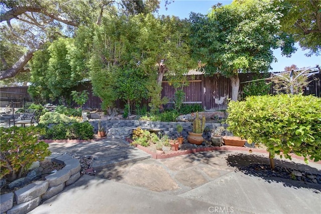 4185 Vanguard Dr, Lompoc, CA 93436 - fenced backyard with a patio area