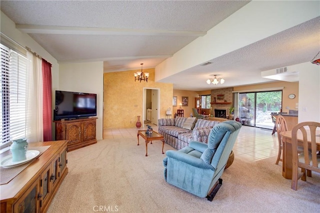 4185 Vanguard Dr, Lompoc, CA 93436 - living area featuring a chandelier, beamed ceiling, light carpet, a textured ceiling, and light tile patterned floors