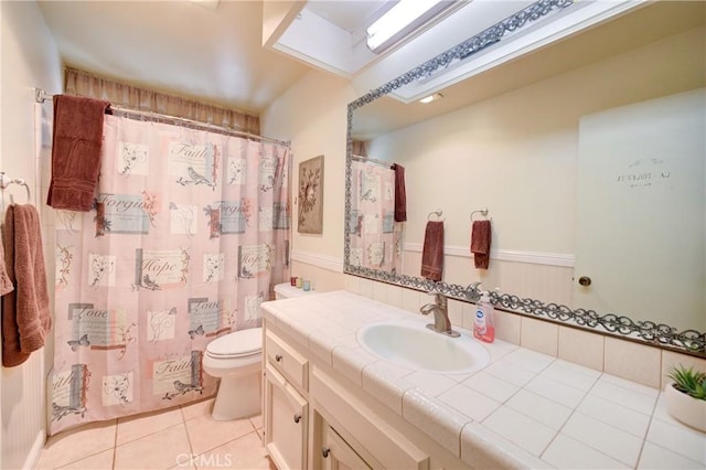 4185 Vanguard Dr, Lompoc, CA 93436 - full bathroom featuring toilet, vanity, tile patterned floors, and curtained shower