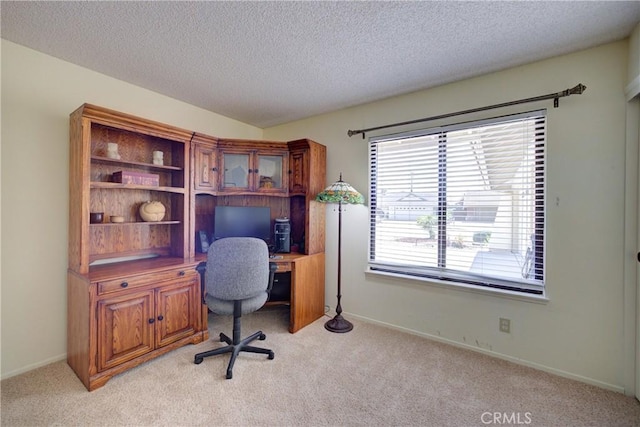 4185 Vanguard Dr, Lompoc, CA 93436 - office area featuring light carpet, a textured ceiling, and baseboards