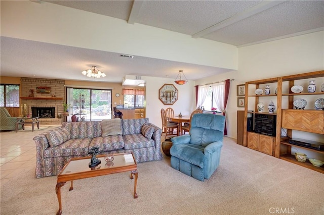 4185 Vanguard Dr, Lompoc, CA 93436 - carpeted living room featuring a textured ceiling, a brick fireplace, and beam ceiling