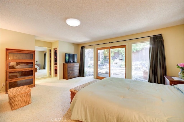 4185 Vanguard Dr, Lompoc, CA 93436 - carpeted bedroom with access to outside and a textured ceiling