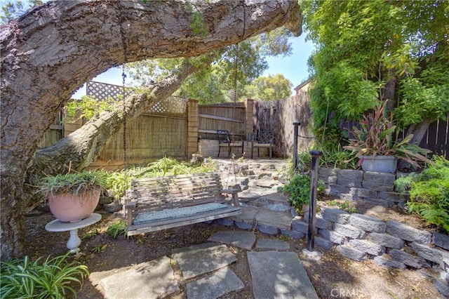4185 Vanguard Dr, Lompoc, CA 93436 - fenced backyard featuring a patio area
