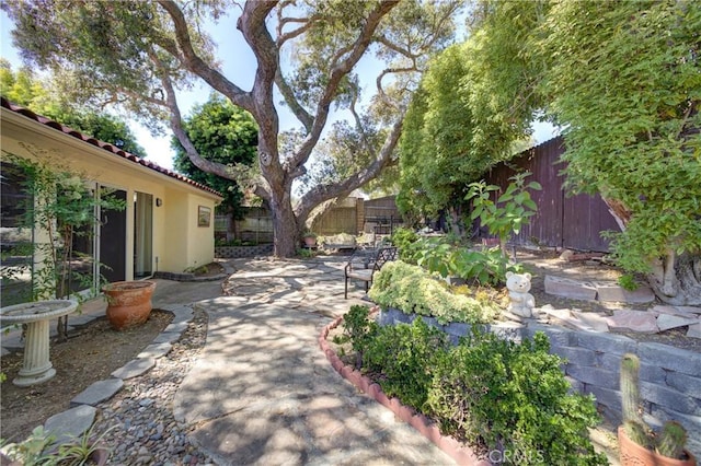 4185 Vanguard Dr, Lompoc, CA 93436 - fenced backyard featuring a patio area