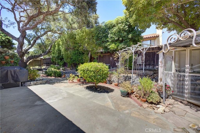 4185 Vanguard Dr, Lompoc, CA 93436 - fenced backyard featuring area for grilling and a patio area