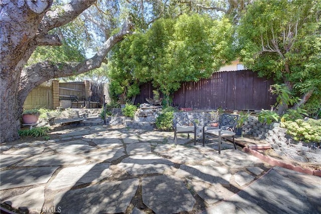 4185 Vanguard Dr, Lompoc, CA 93436 - fenced backyard with a patio area