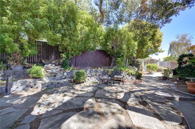4185 Vanguard Dr, Lompoc, CA 93436 - fenced backyard featuring a patio