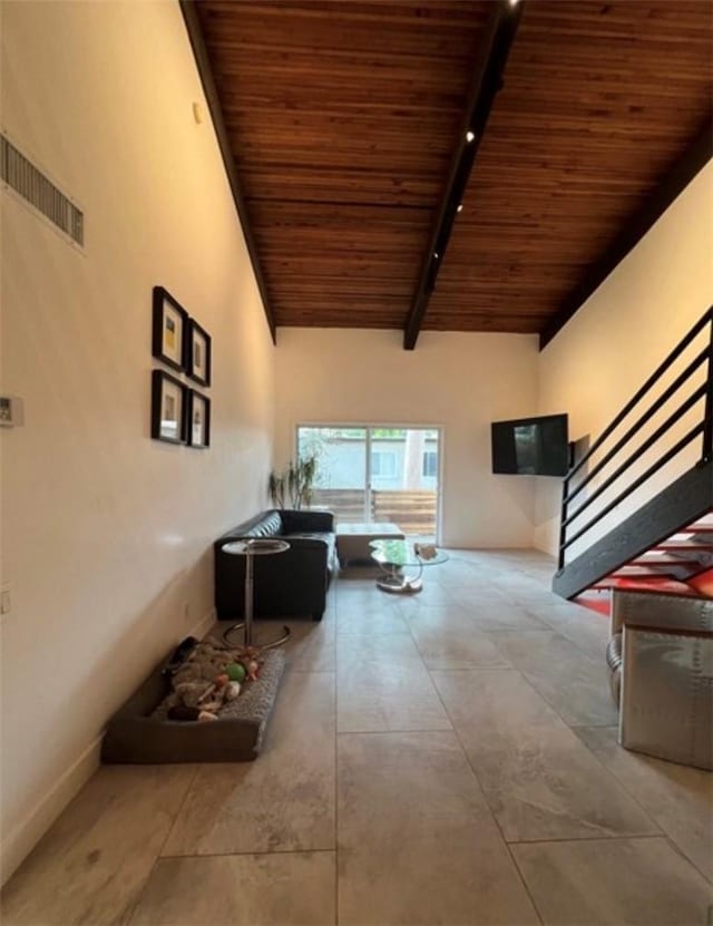 5460 White Oak Ave Unit A305, Encino, CA 91316 - hall featuring wooden ceiling with exposed beams, high vaulted ceiling, stairs, and baseboards