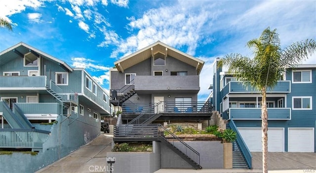 34051 Silver Lantern St, Dana Point, CA 92629 - view of front of property featuring stairway, driveway, and a garage