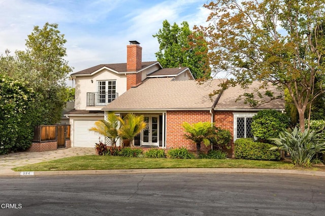394 S Bonnie Ave, Pasadena, CA 91106 - traditional home with a balcony, a chimney, concrete driveway, an attached garage, and roof with shingles