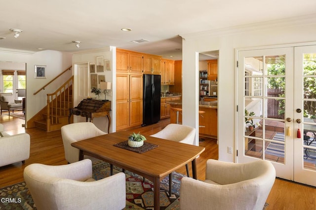 394 S Bonnie Ave, Pasadena, CA 91106 - dining room featuring french doors, crown molding, stairs, light wood-style floors, and recessed lighting
