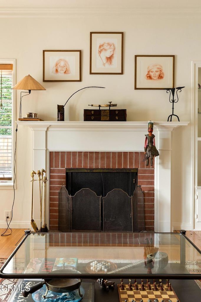 394 S Bonnie Ave, Pasadena, CA 91106 - detailed view of a brick fireplace, crown molding, and baseboards