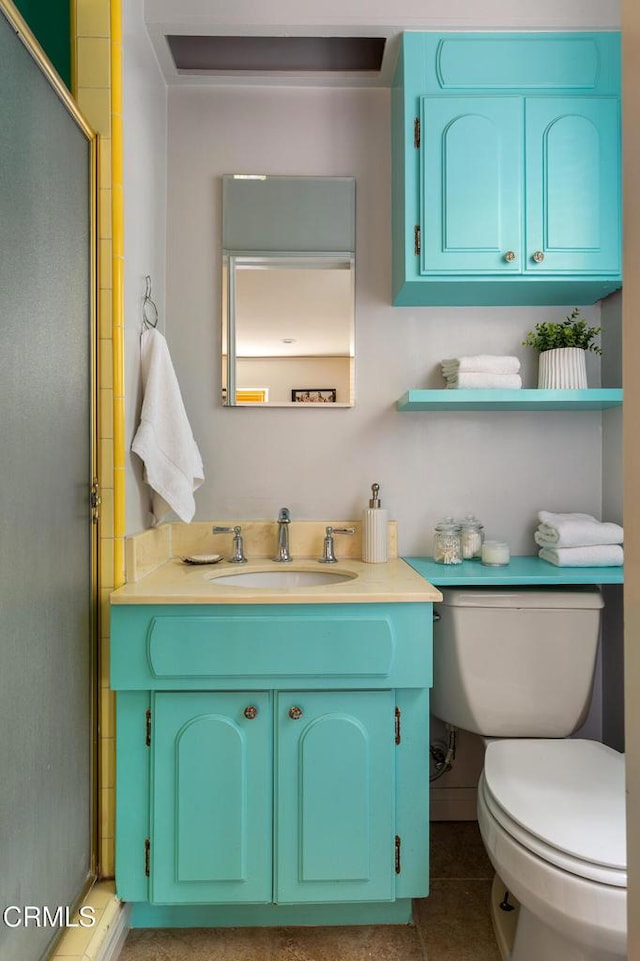 394 S Bonnie Ave, Pasadena, CA 91106 - full bathroom featuring toilet, vanity, a shower with door, and tile patterned flooring