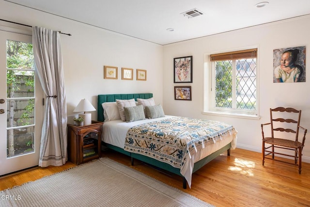 394 S Bonnie Ave, Pasadena, CA 91106 - bedroom featuring multiple windows and light wood-style floors