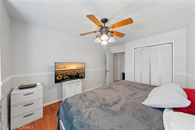 27175 Via Debra, Menifee, CA 92586 - bedroom featuring wood finished floors, a closet, a ceiling fan, and baseboards